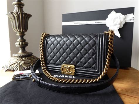 chanel 25cm black caviar boy bag